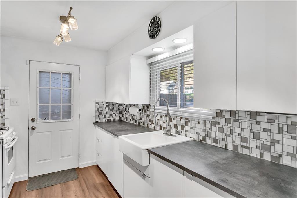 734 Jefferson Road Pittsburgh, PA 15235 - Photo 11 of 29 a bathroom with a sink a vanity and a mirror