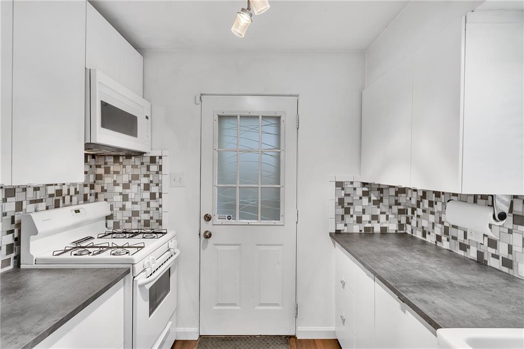 734 Jefferson Road Pittsburgh, PA 15235 - Photo 13 of 29 a kitchen with a stove and a sink