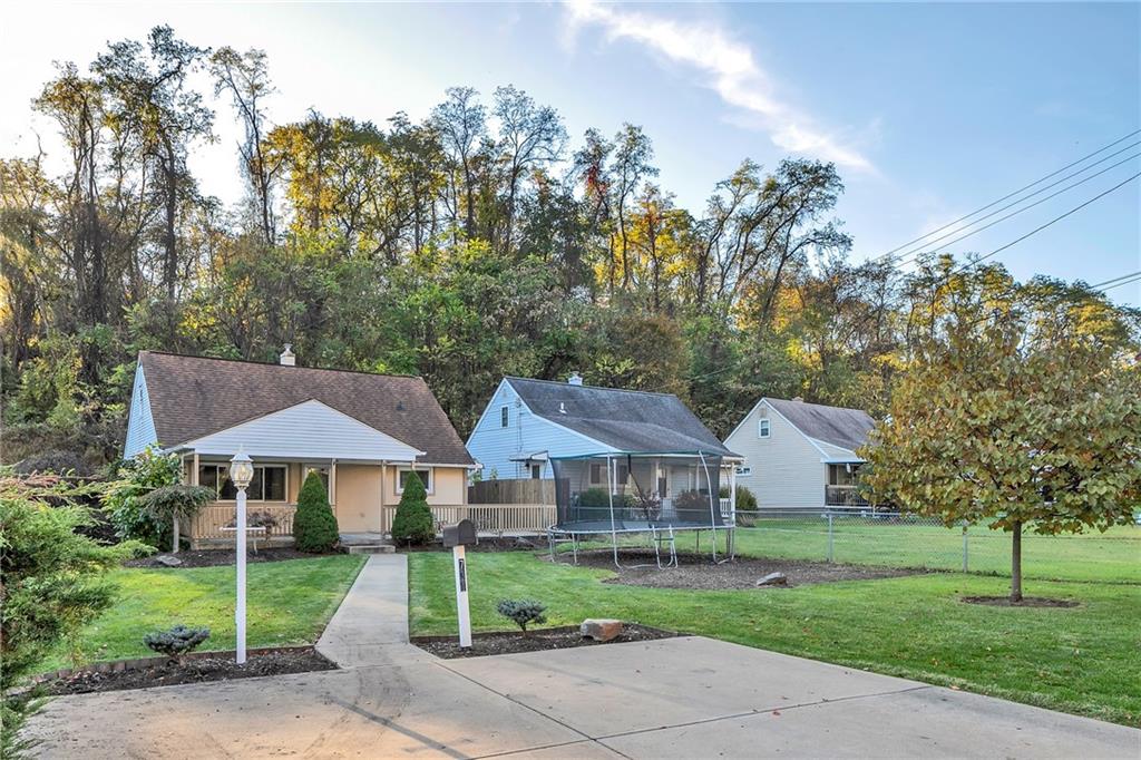 734 Jefferson Road Pittsburgh, PA 15235 - Photo 2 of 29 a front view of a house with a yard