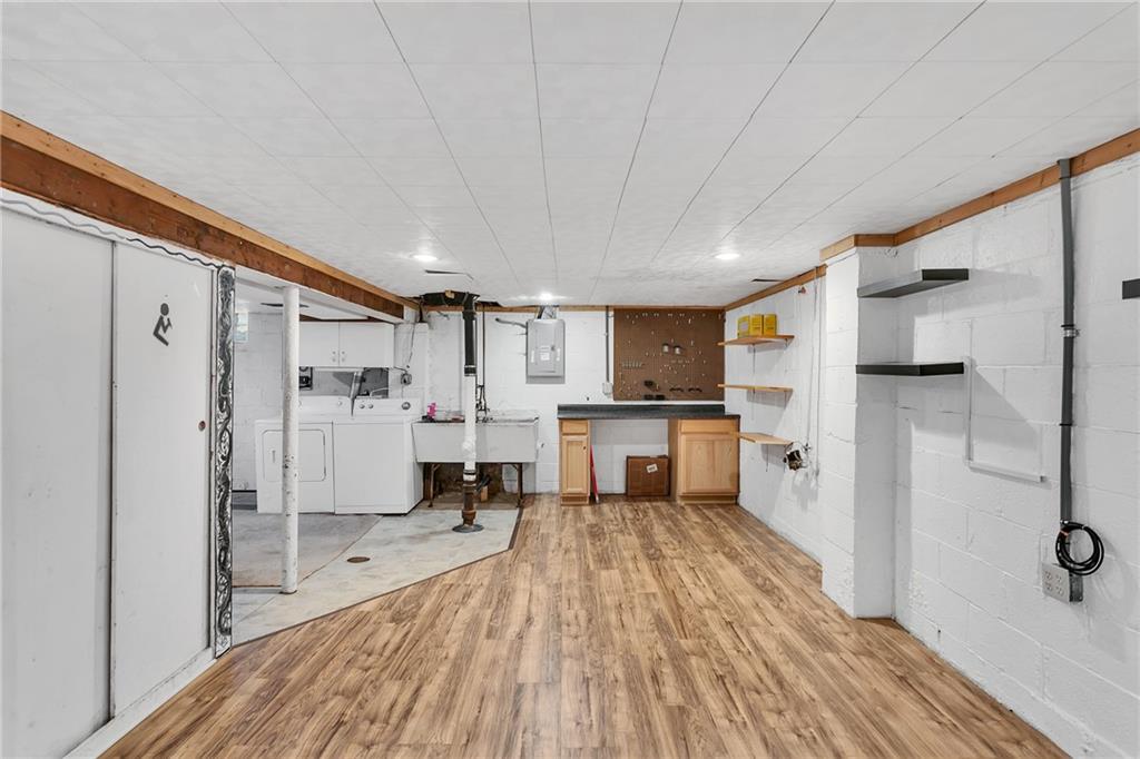 734 Jefferson Road Pittsburgh, PA 15235 - Photo 23 of 29 a kitchen with white cabinets and stainless steel appliances