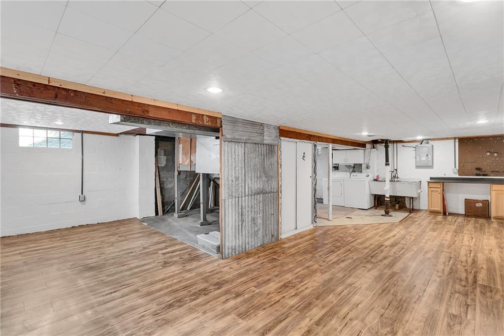734 Jefferson Road Pittsburgh, PA 15235 - Photo 26 of 29 a view of a livingroom with furniture and a kitchen