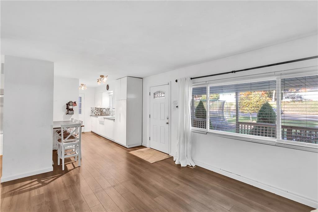 734 Jefferson Road Pittsburgh, PA 15235 - Photo 8 of 29 wooden floor in an empty room with a window