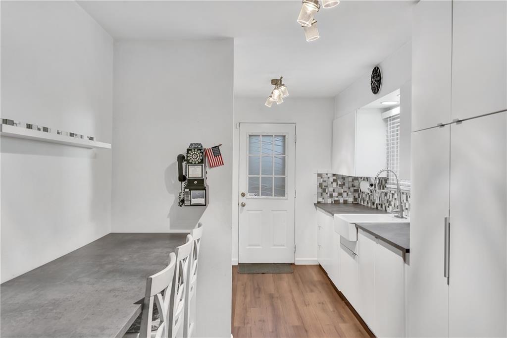 734 Jefferson Road Pittsburgh, PA 15235 - Photo 10 of 29 a kitchen with a refrigerator and a stove