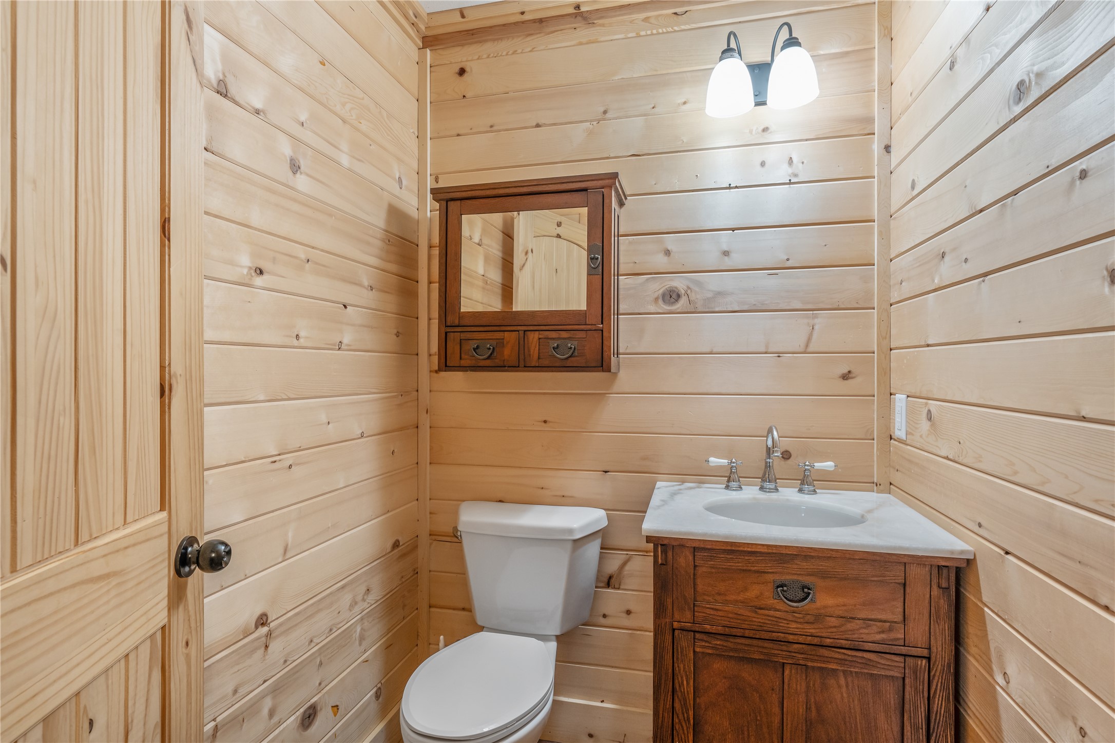 6751 County Road 4710 Larue, TX 75770 - Photo 31 of 47 a bathroom with a sink a toilet and shower