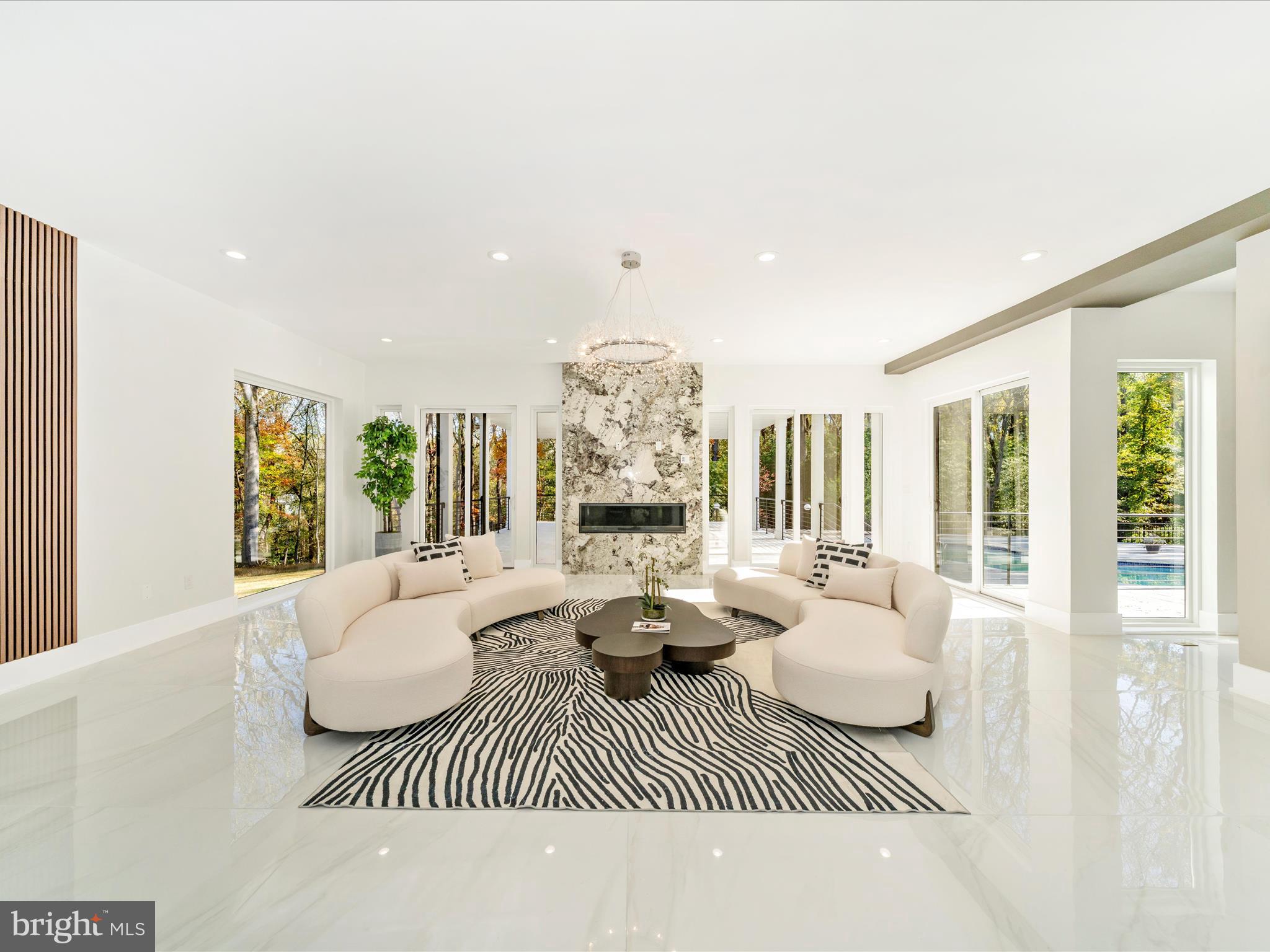 2209 Hunter Mill Road Vienna, VA 22181 - Photo 11 of 102 a living room with furniture and a large window