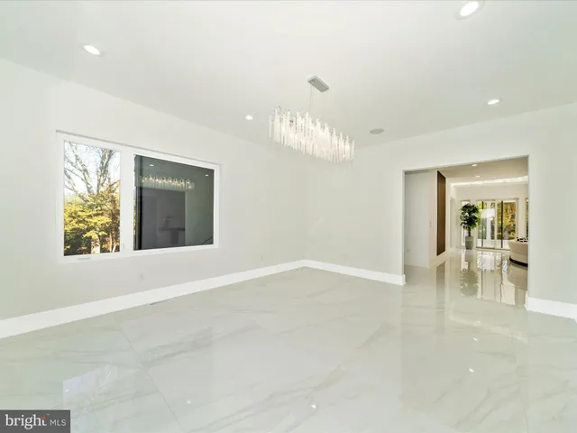 a kitchen with a sink and refrigerator
