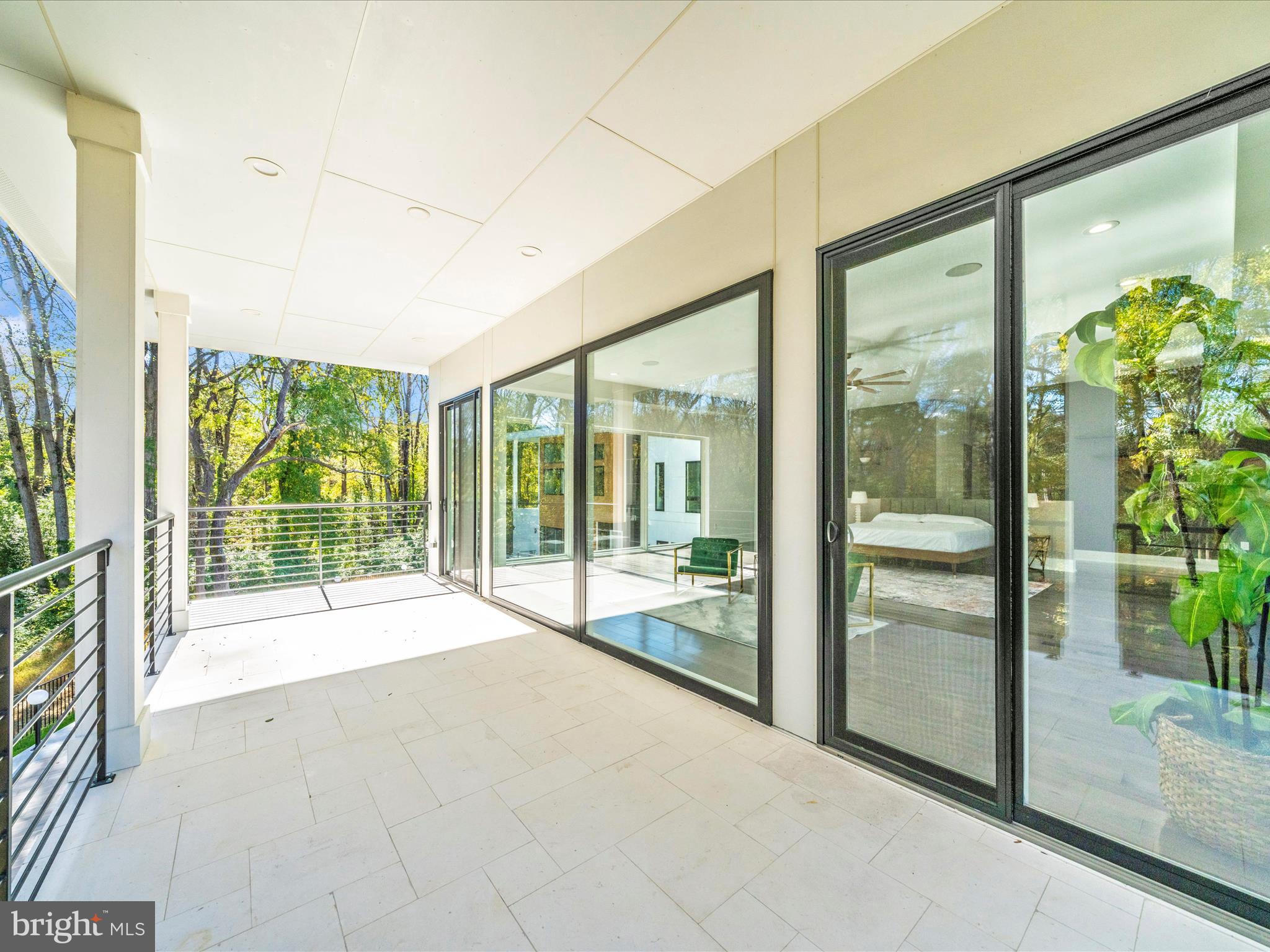 2209 Hunter Mill Road Vienna, VA 22181 - Photo 46 of 102 a view of a room with a large window and an outdoor view