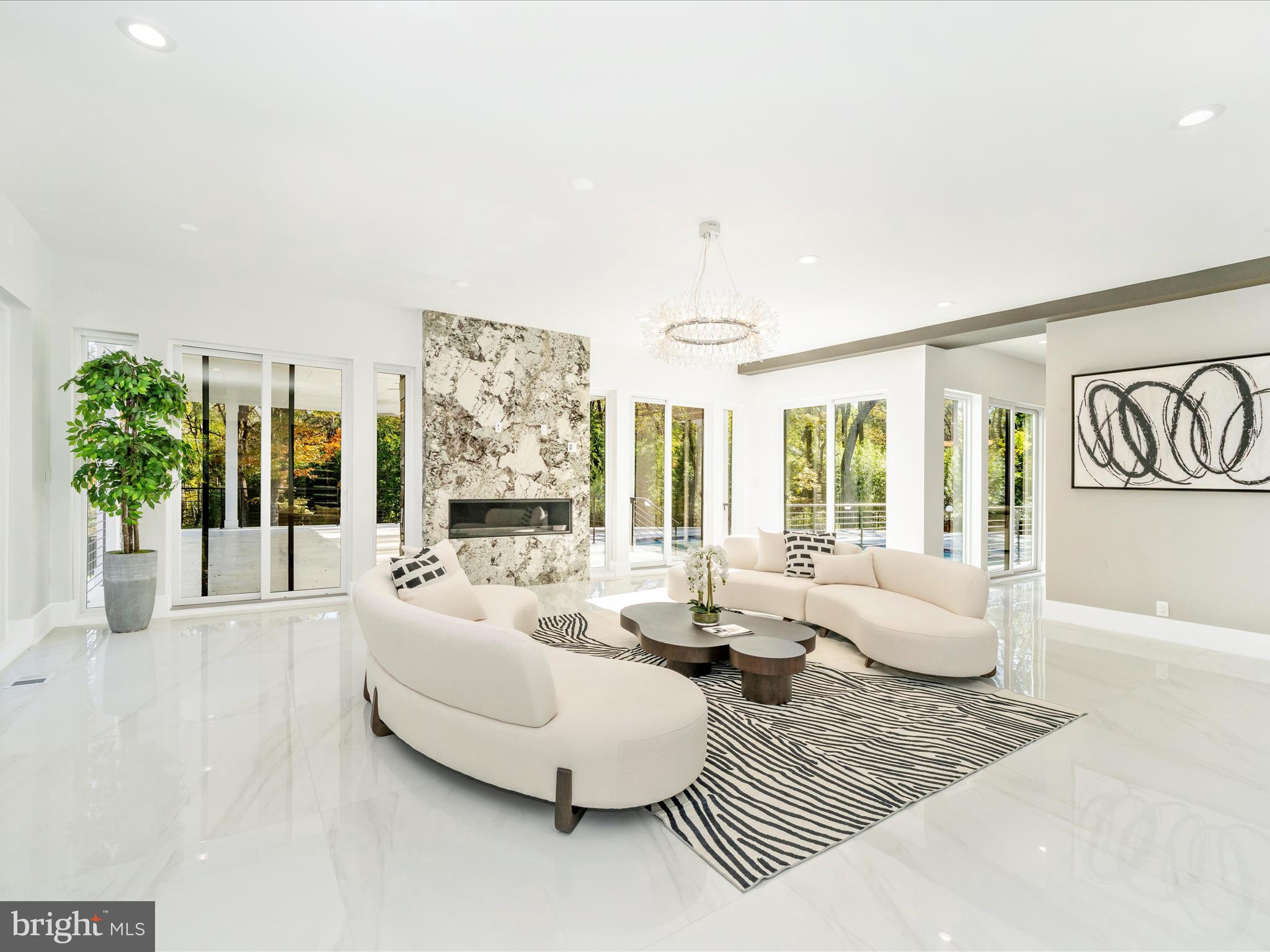 2209 Hunter Mill Road Vienna, VA 22181 - Photo 8 of 102 a living room with furniture and a large window