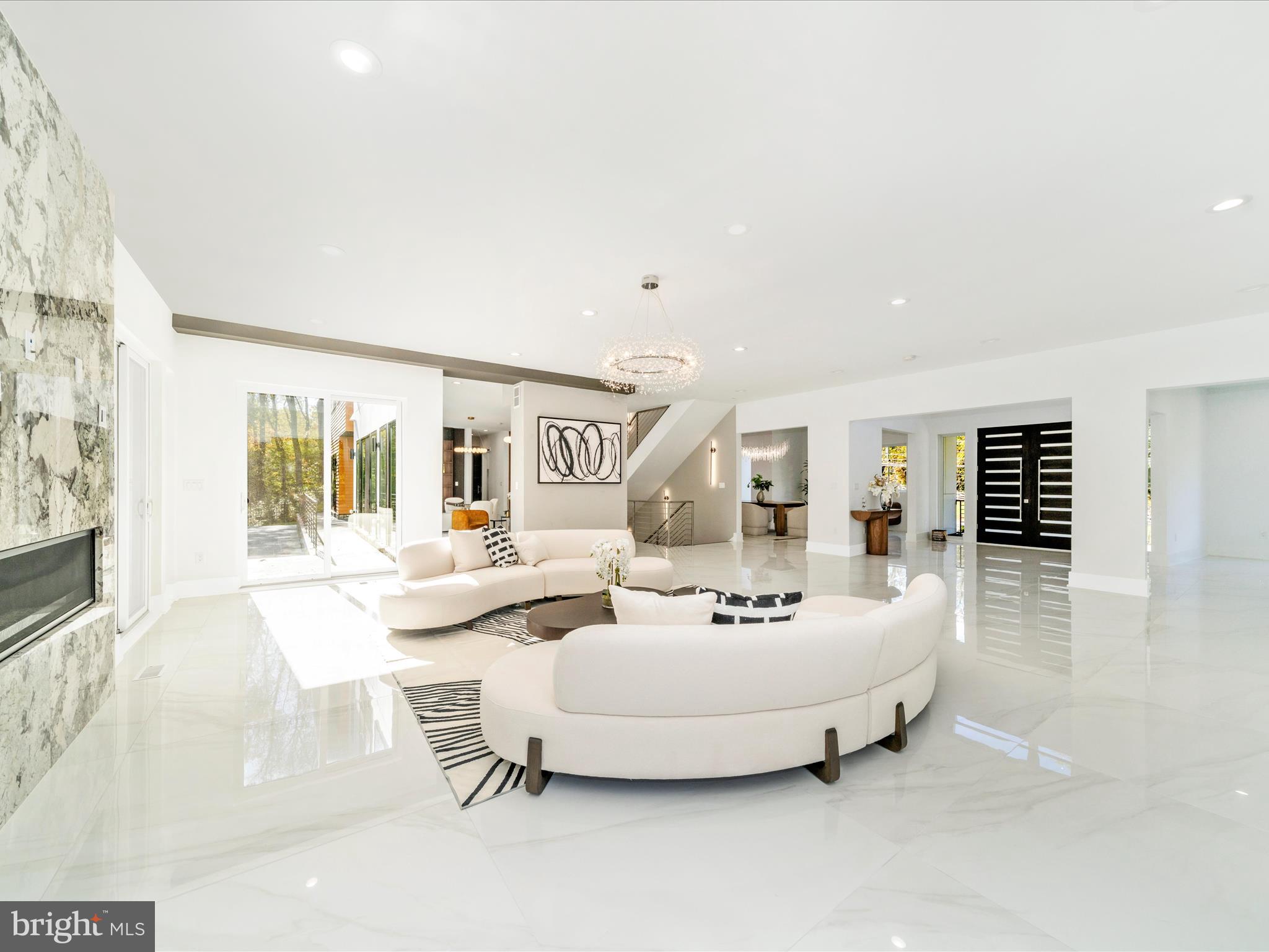 2209 Hunter Mill Road Vienna, VA 22181 - Photo 9 of 102 a living room with furniture and a large window