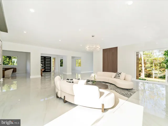 a kitchen with a sink and breakfast area