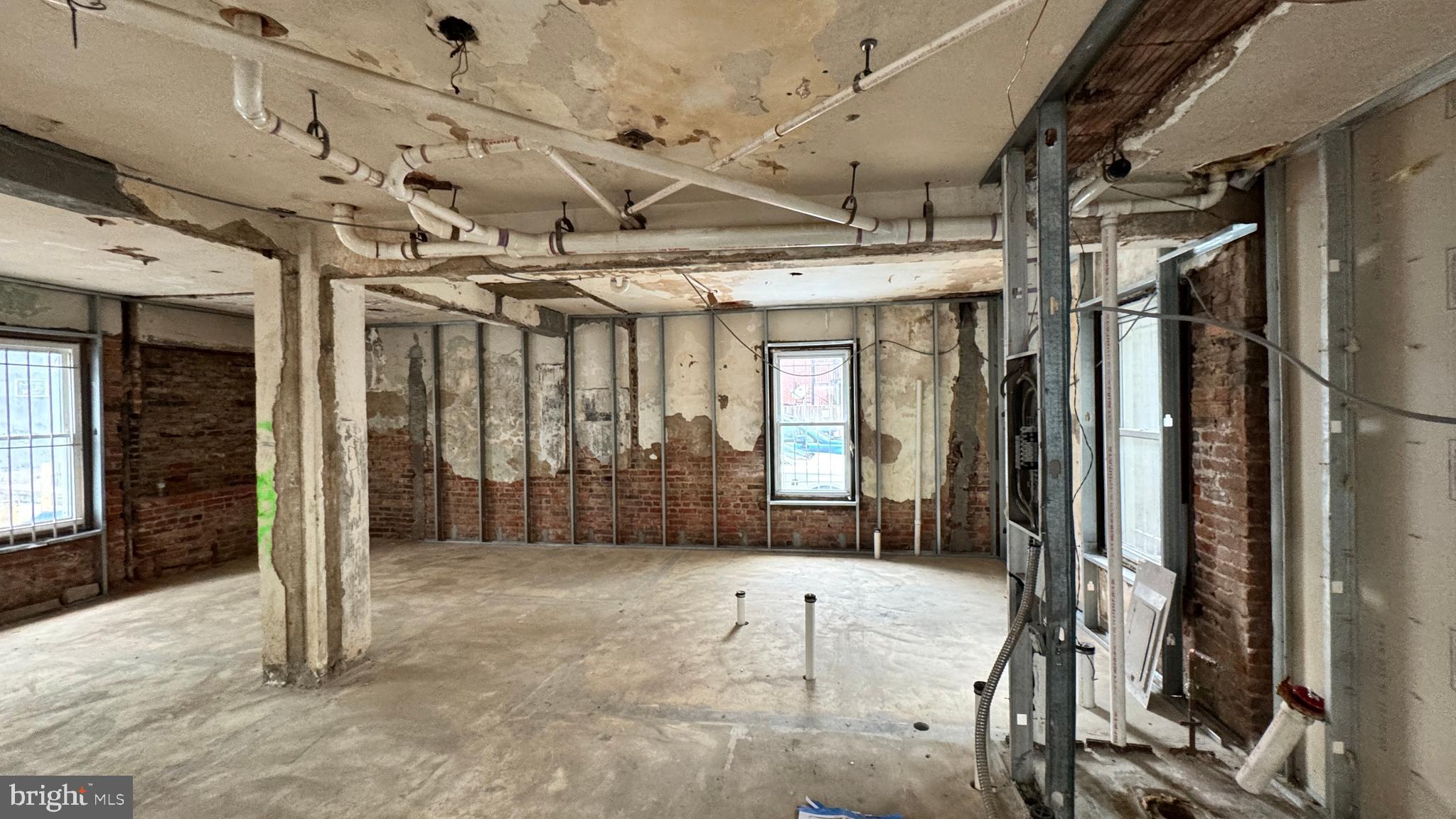 1745 Kalorama Road Northwest, Unit 101 Washington, DC 20009 - Photo 14 of 23 a view of a porch with furniture and a refrigerator