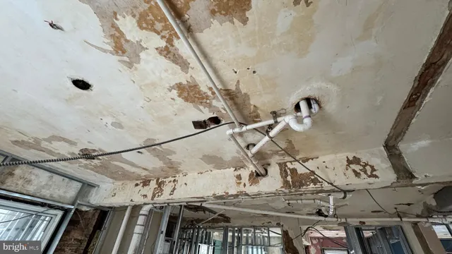 a view of a porch with a floor to ceiling window