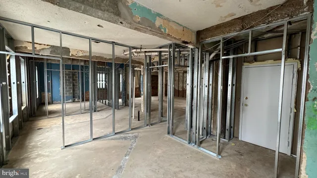 a view of a room with glass door