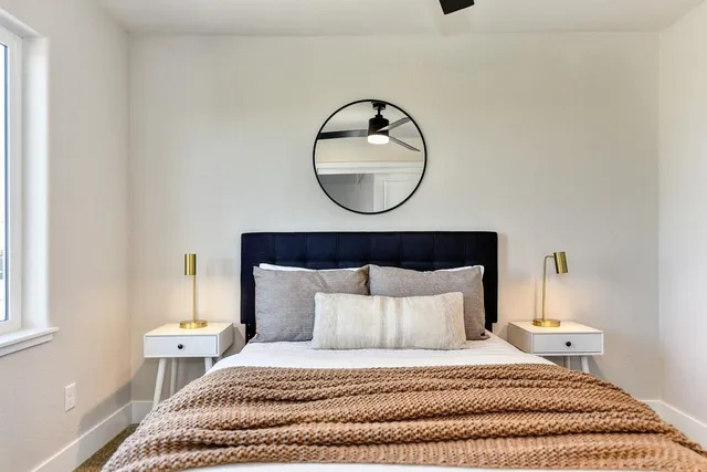 a kitchen with stainless steel appliances granite countertop a sink stove and microwave