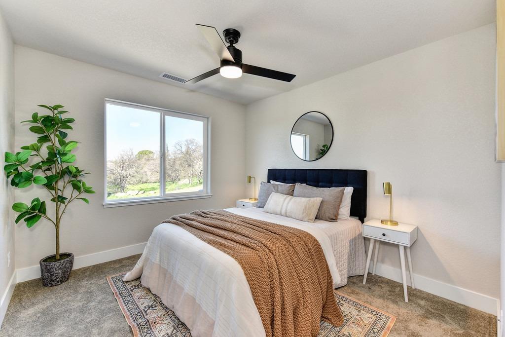 2660 Commons Place Auburn, CA 95603 - Photo 24 of 55 a bedroom with bed and a window