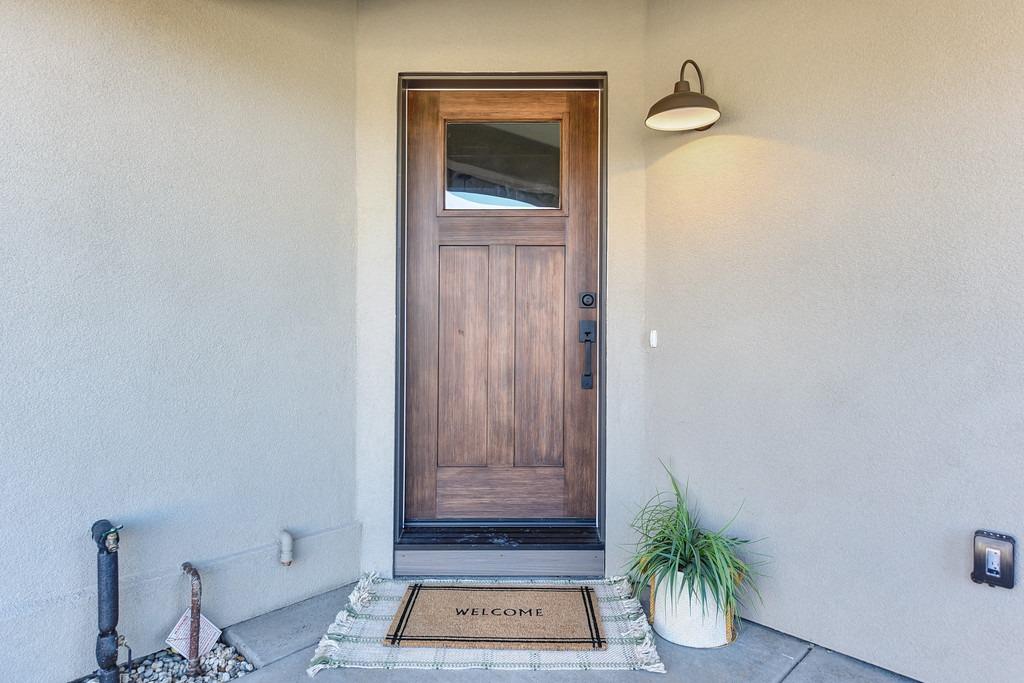 2660 Commons Place Auburn, CA 95603 - Photo 8 of 55 a view of an entryway with wooden floor