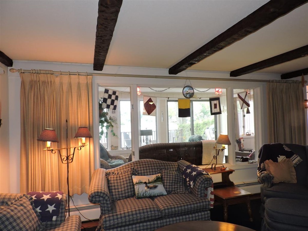 46 Point Pleasant Road Webster, MA 01570 - Photo 15 of 30 a living room with furniture and a large window