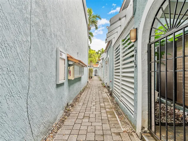 a view of a pathway both side of building