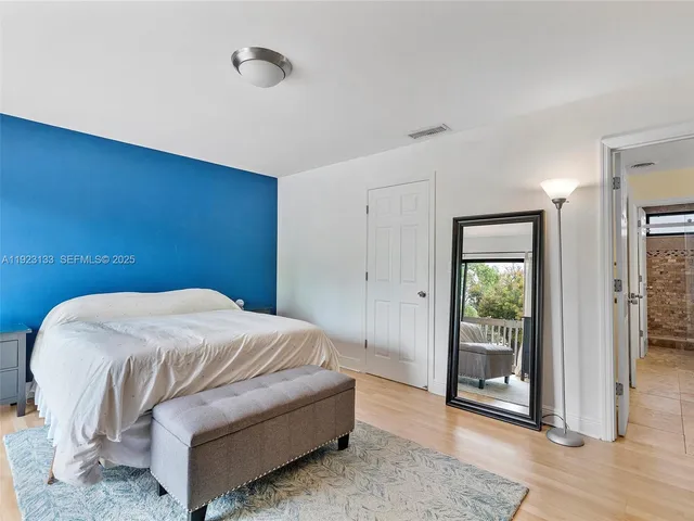 a view of a street from a balcony