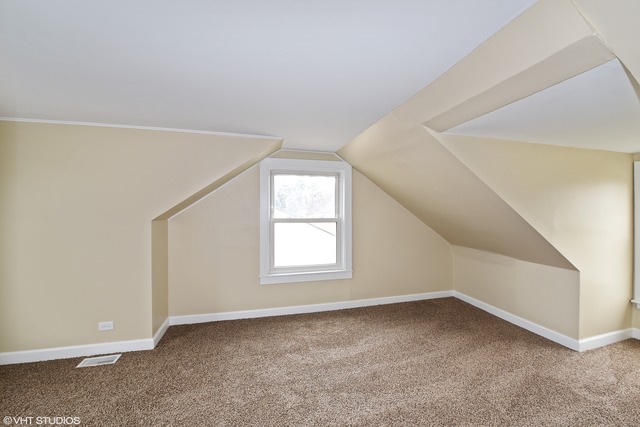 1915 Herbert Avenue Berkeley, IL 60163 - Photo 8 of 10 an empty room with windows
