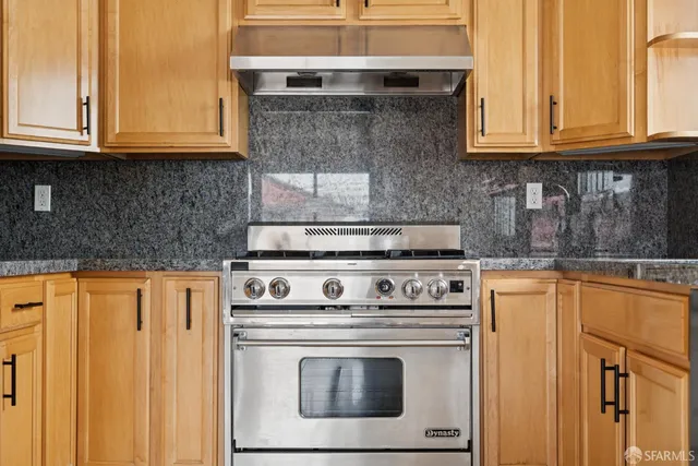 a view of hallway with wooden floor
