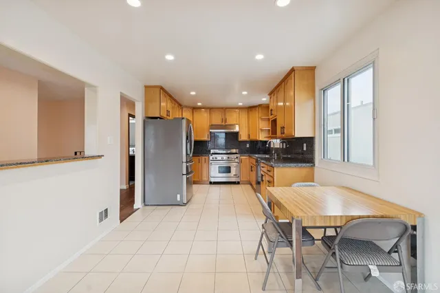 a bathroom with a shower and mirror