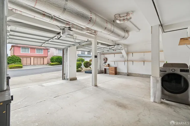 a stove top oven sitting inside of a kitchen