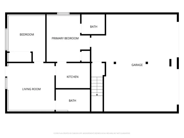 a view of a hallway with wooden floor and stairs