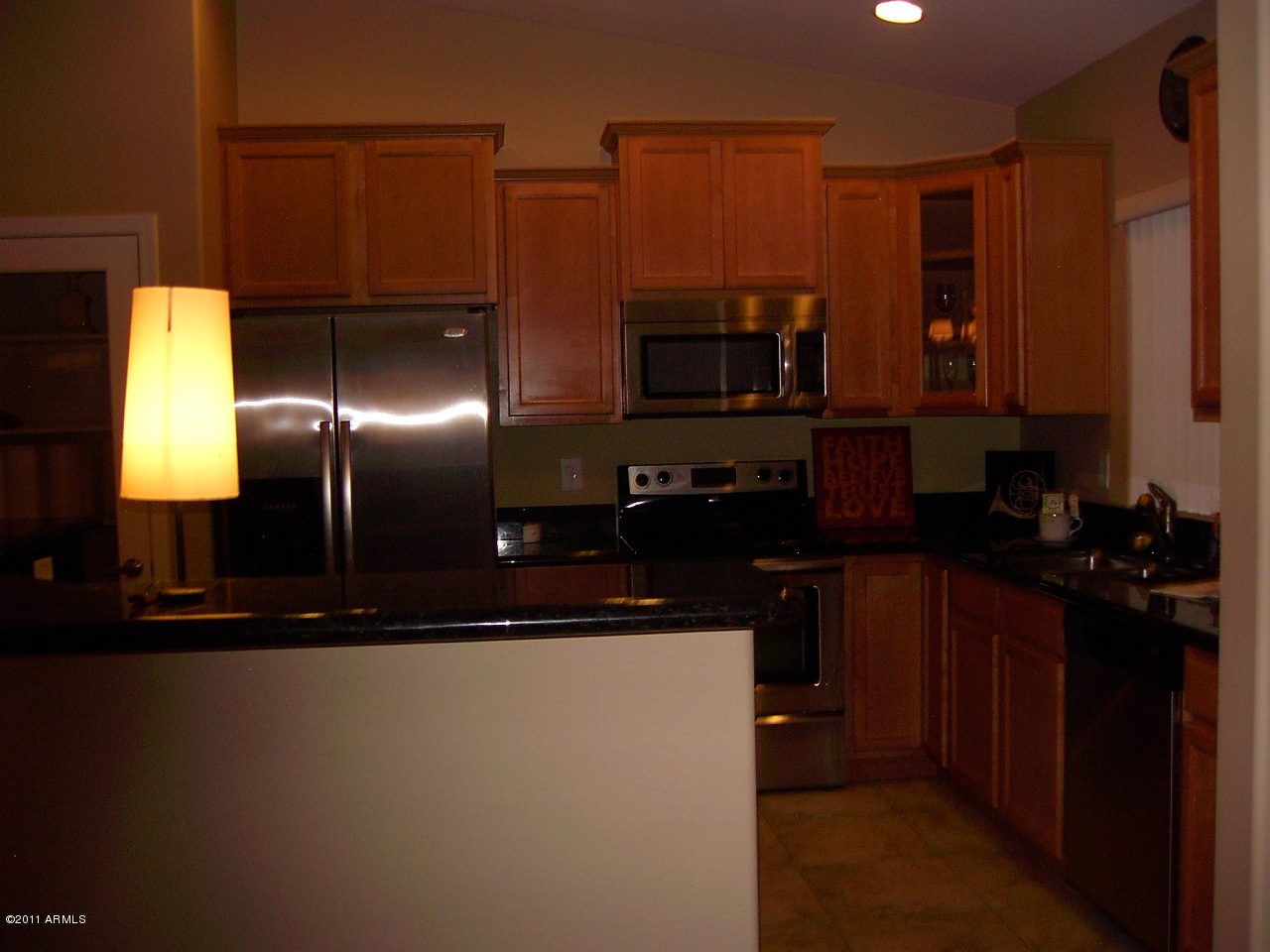 2661 South Conestoga Road Apache Junction, AZ 85119 - Photo 13 of 14 Kitchen with Maple Cabinets
