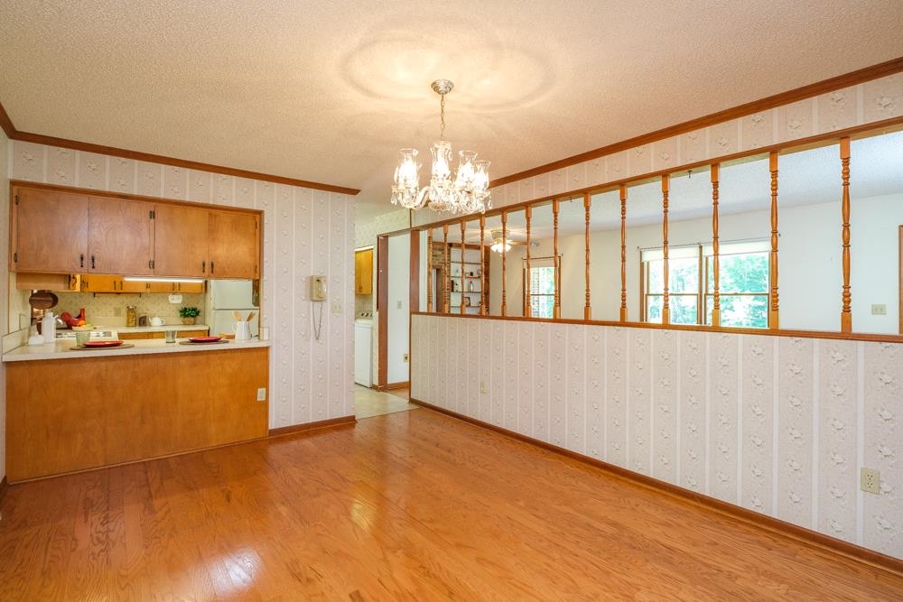 20982 Bennett Run Road Bergton, VA 22811 - Photo 13 of 54 a large kitchen with stainless steel appliances wooden floor and a refrigerator