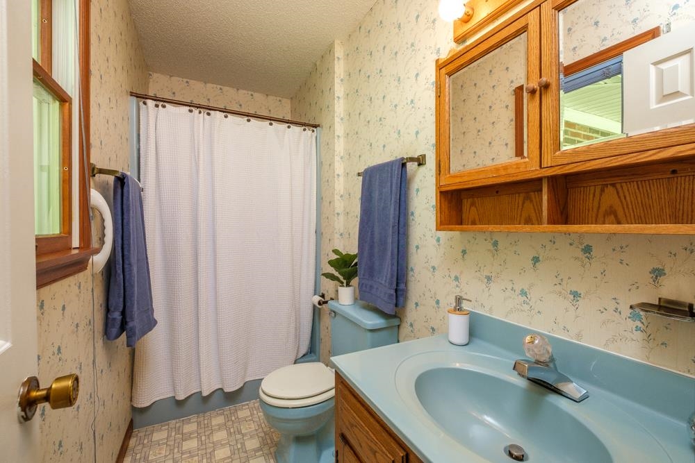 20982 Bennett Run Road Bergton, VA 22811 - Photo 22 of 54 a bathroom with a sink toilet and shower