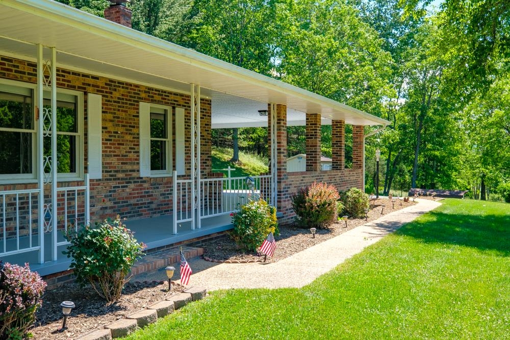 20982 Bennett Run Road Bergton, VA 22811 - Photo 30 of 54 a front view of a house with garden
