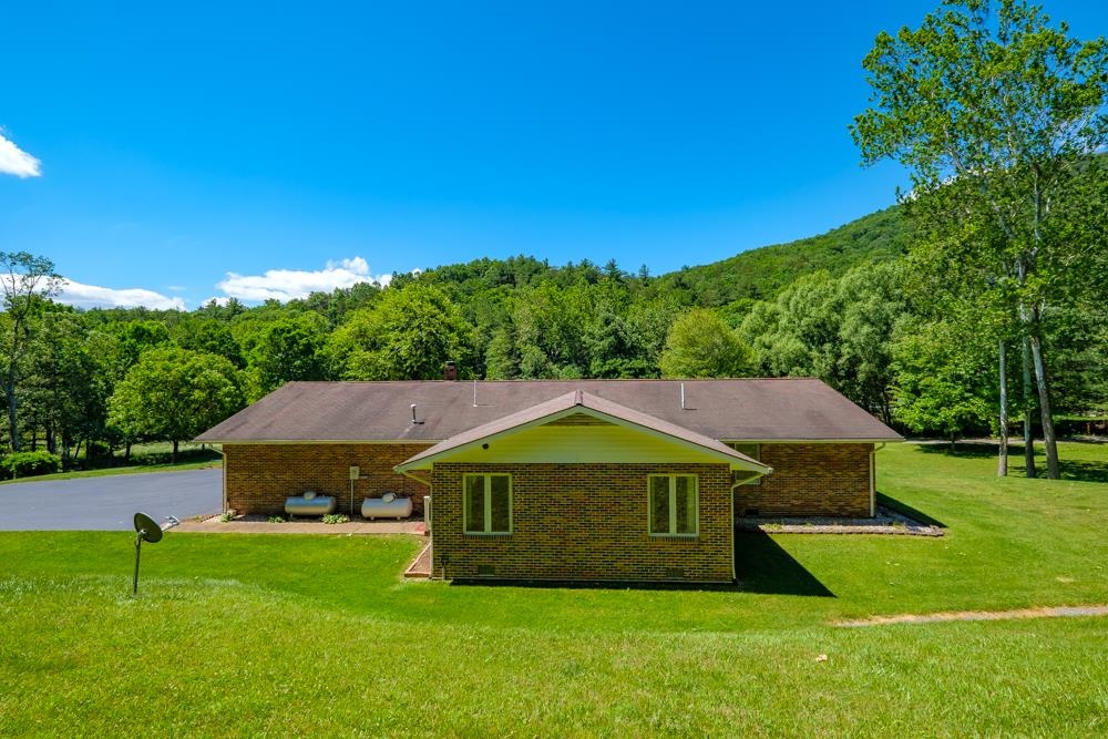 20982 Bennett Run Road Bergton, VA 22811 - Photo 36 of 54 a view of a house with a yard