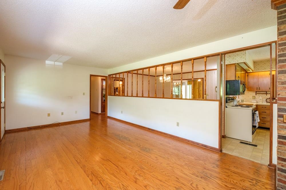 20982 Bennett Run Road Bergton, VA 22811 - Photo 4 of 54 a view of a room with wooden floor and stairs