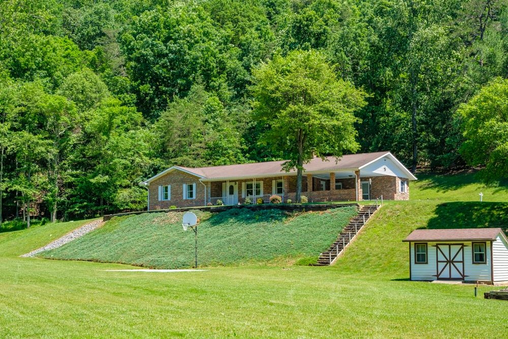 20982 Bennett Run Road Bergton, VA 22811 - Photo 42 of 54 a view of house with a big yard and large trees