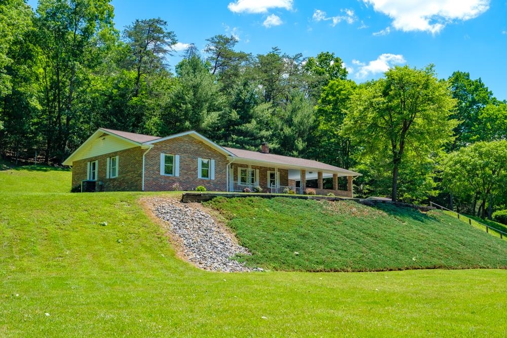 20982 Bennett Run Road Bergton, VA 22811 - Photo 44 of 54 a front view of a house with garden