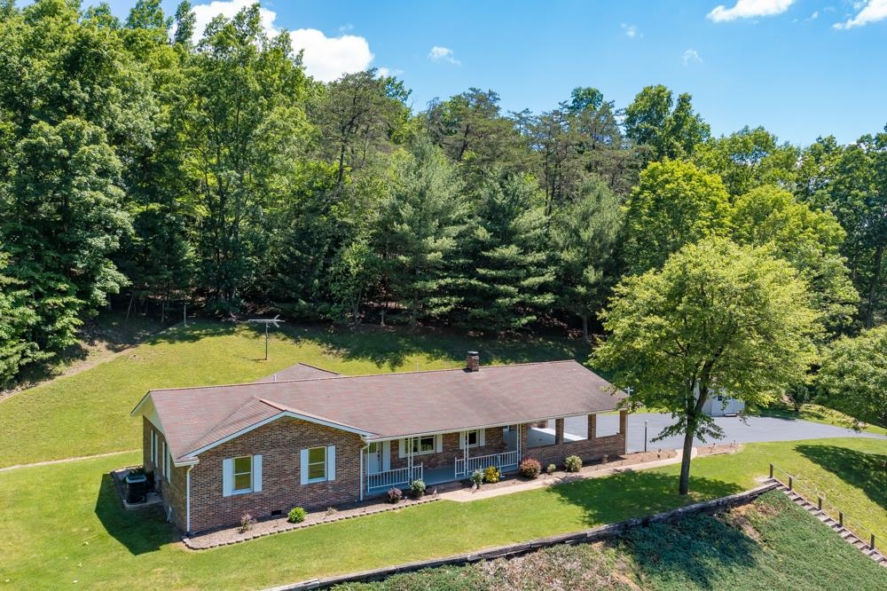 20982 Bennett Run Road Bergton, VA 22811 - Photo 50 of 54 a front view of a house with garden