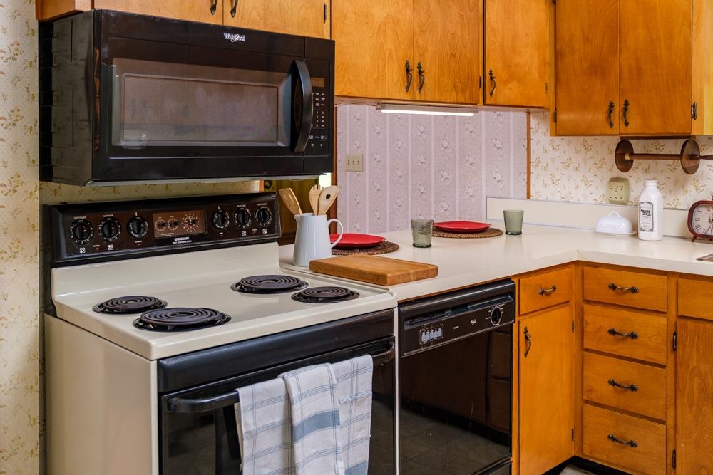 20982 Bennett Run Road Bergton, VA 22811 - Photo 9 of 54 a kitchen with stainless steel appliances granite countertop a stove and a microwave