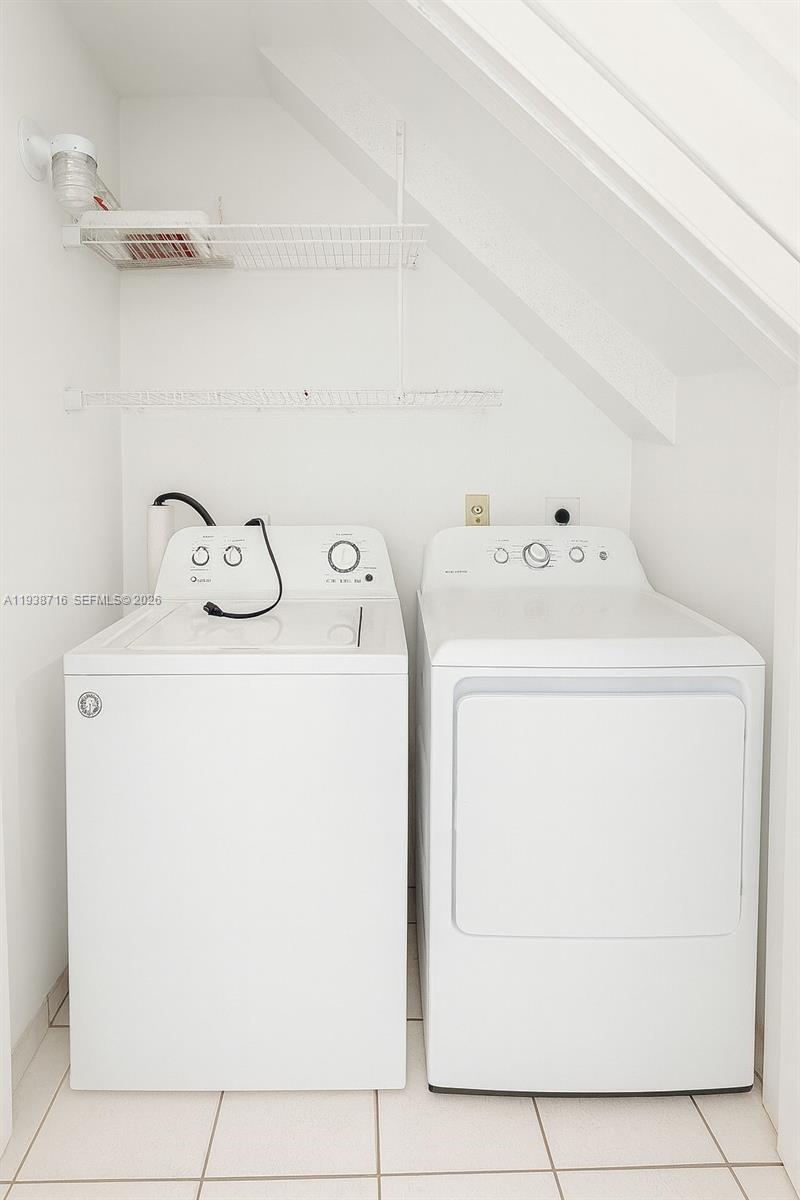 8170 Northwest 10th Street, Unit 2 Miami, FL 33126 - Photo 10 of 10 a utility room with dryer and washer
