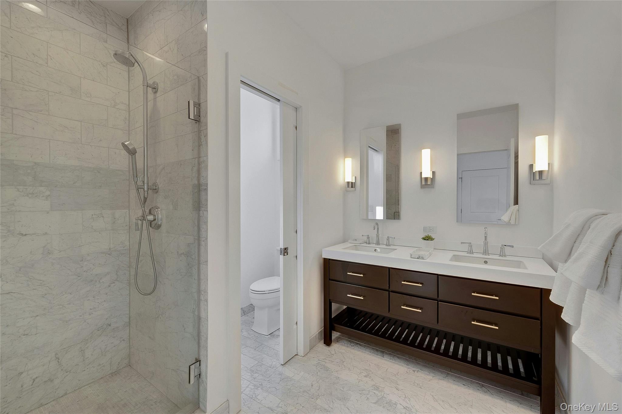 39 Island Point Bronx, NY 10464 - Photo 14 of 37 a bathroom with a double vanity sink mirror and double