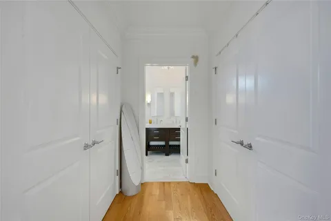 a bathroom with a double vanity sink mirror and double