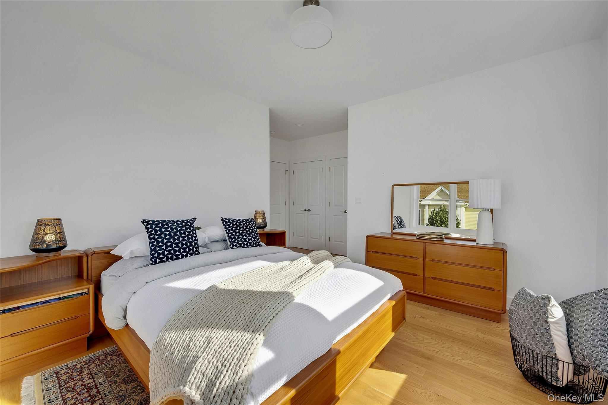 39 Island Point Bronx, NY 10464 - Photo 16 of 37 a bedroom with a bed and dresser