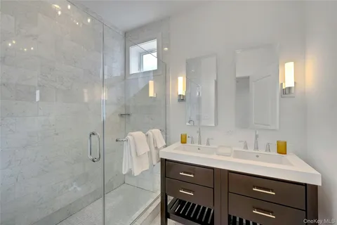 a bedroom with a bed and dresser