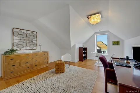 a outdoor living space with furniture and a potted plant