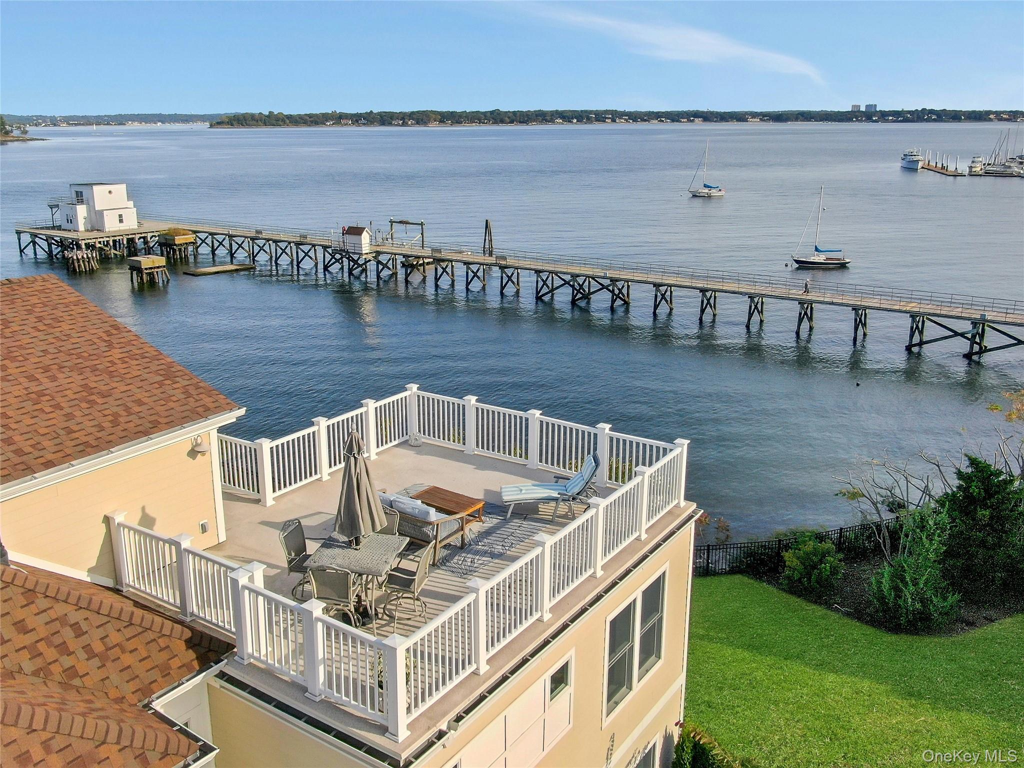 39 Island Point Bronx, NY 10464 - Photo 27 of 37 a view of a house with outdoor space and lake view