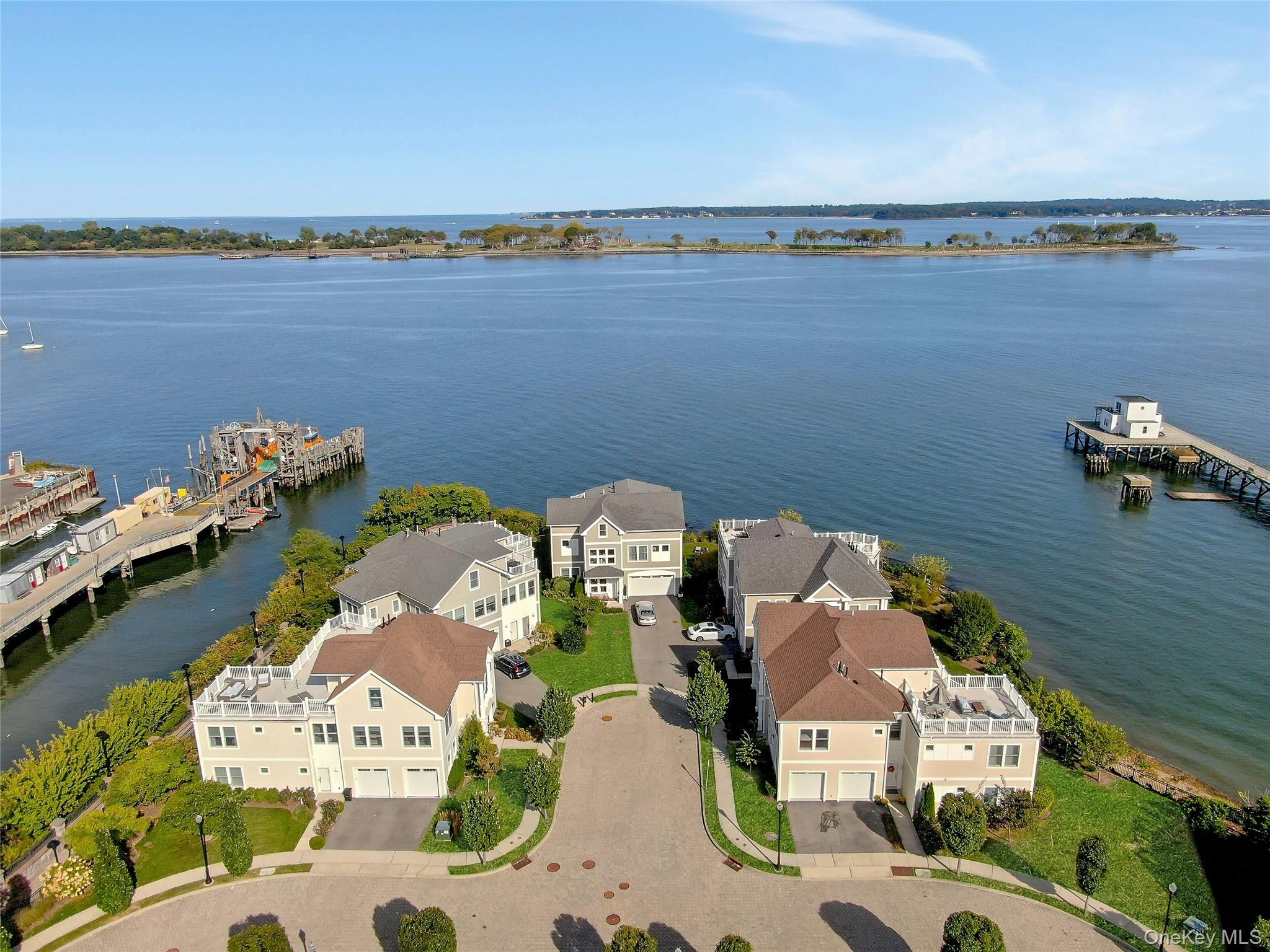 39 Island Point Bronx, NY 10464 - Photo 33 of 37 an aerial view of a house with a swimming pool outdoor seating and yard
