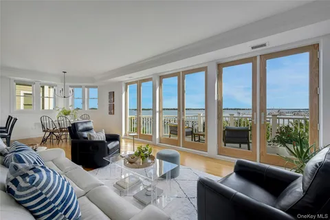 a view of livingroom with furniture and workspace