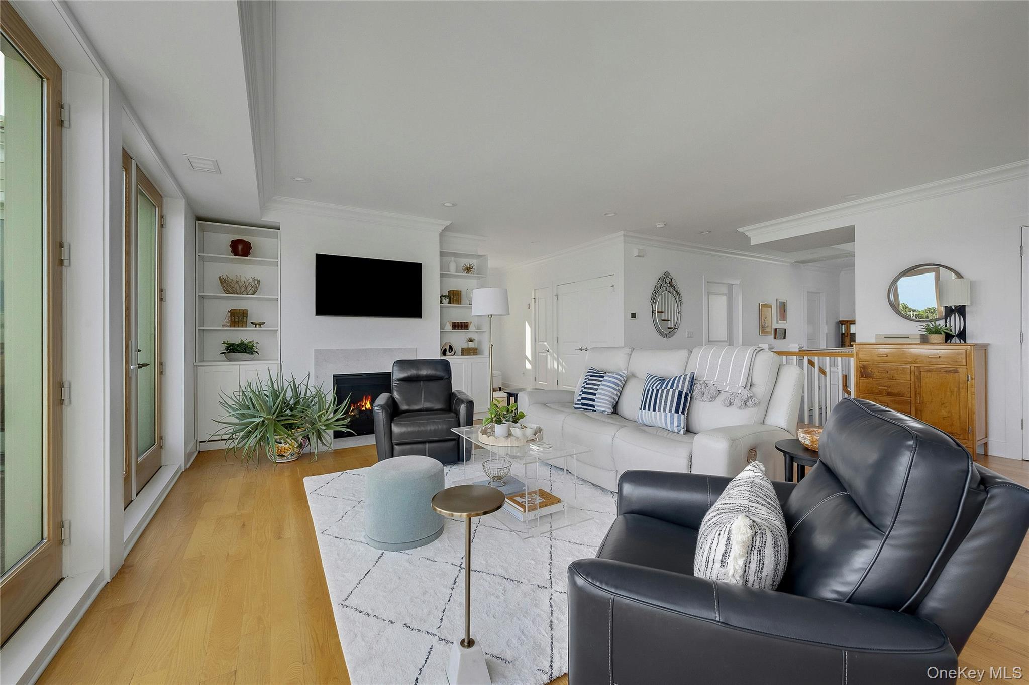 39 Island Point Bronx, NY 10464 - Photo 7 of 37 a living room with furniture and a flat screen tv