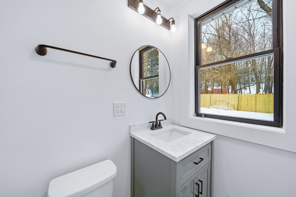26 Rivulet Street Uxbridge, MA 01569 - Photo 18 of 41 a bathroom with a toilet and a sink