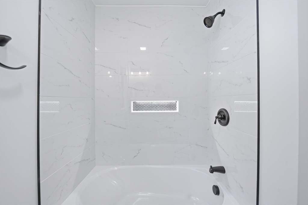 26 Rivulet Street Uxbridge, MA 01569 - Photo 19 of 41 a bathroom with a shower